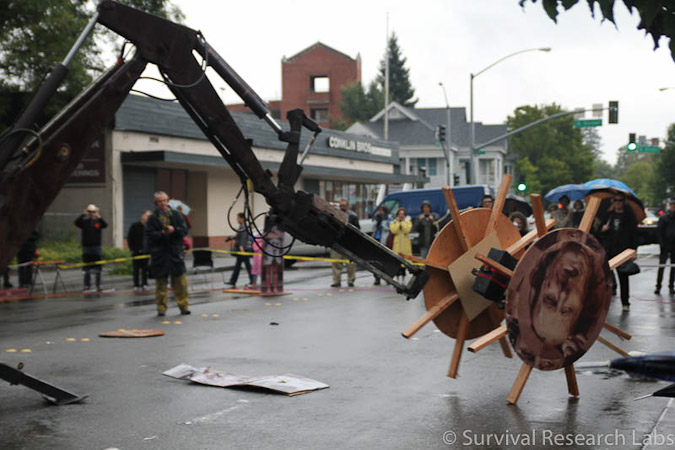 Big Arm vs Stick Wheel Robot