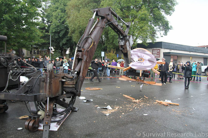 Big Arm vs Stick Wheel Robot