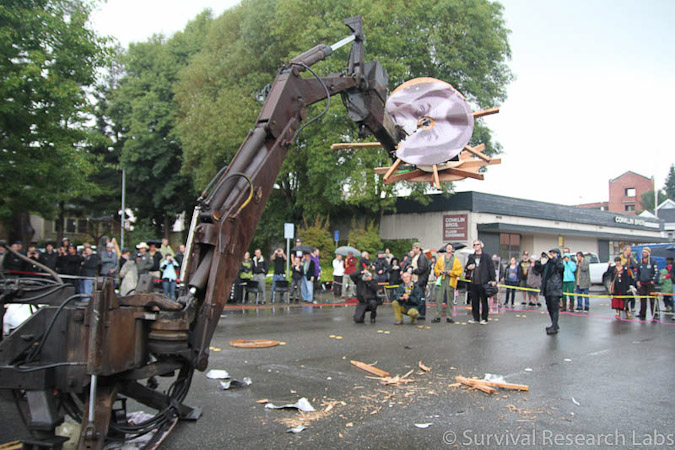 Big Arm vs Stick Wheel Robot