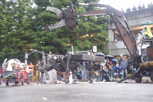 Bug Bot tries to escape the Running Machine and Big Arm