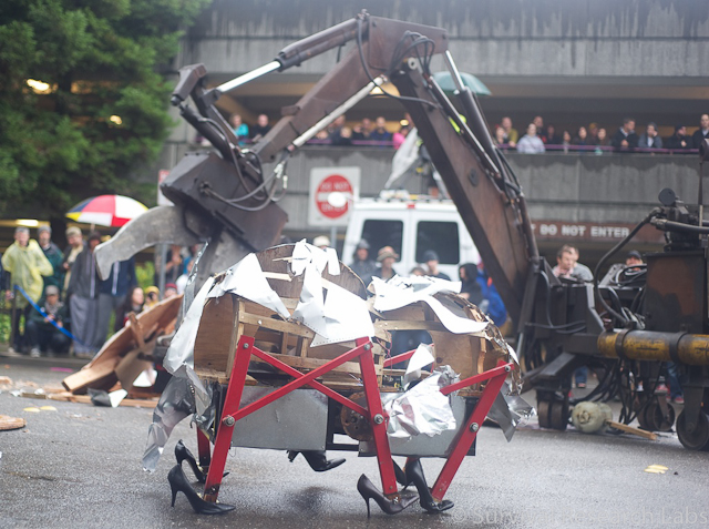 Big Arm tries to destroy the Bug Bot