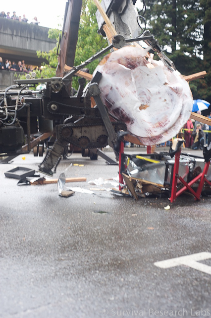 Big Arm drops the Stick Wheel Robot on the Running Machine and Bug Bot